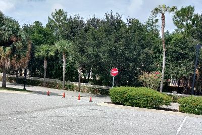 Faded parking lot signs & lines