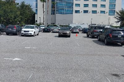 Faded parking lot signs & lines