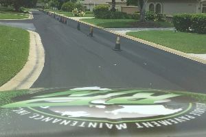 Liquid road sealcoating