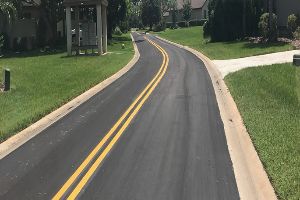 Liquid road sealcoating